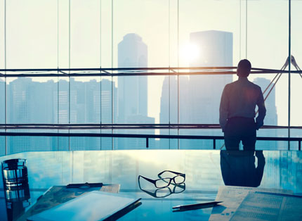 Businessman in Office Modern Skyscraper Landscape Background